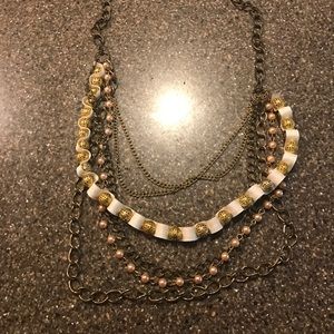 Multi strand gold tone necklace